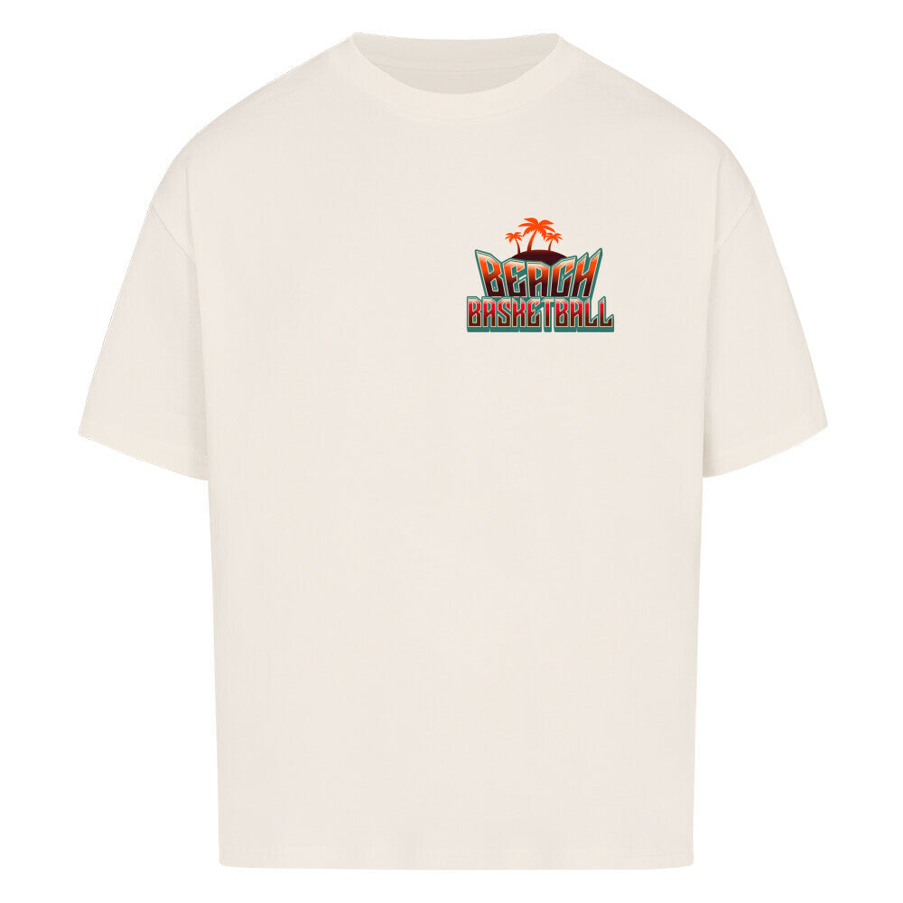 Kleiner "Beach Basketball" Retro-Print mit Palmen in Orange und Türkis auf der linken Brust eines natural raw Oversized T-Shirts. 100% Baumwolle