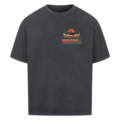 Kleiner "Beach Basketball" Retro-Print mit Palmen in Orange und Türkis auf der linken Brust eines washed schwarzen Oversized T-Shirts. 100% Baumwolle