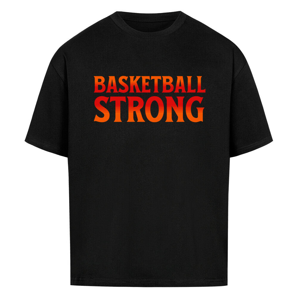 Schwarzes Oversized Basketball T-Shirt mit dem Print „BASKETBALL STRONG“ in einer ikonischen, rot-orangen Retro-Schriftart. Aus 100% Baumwolle.