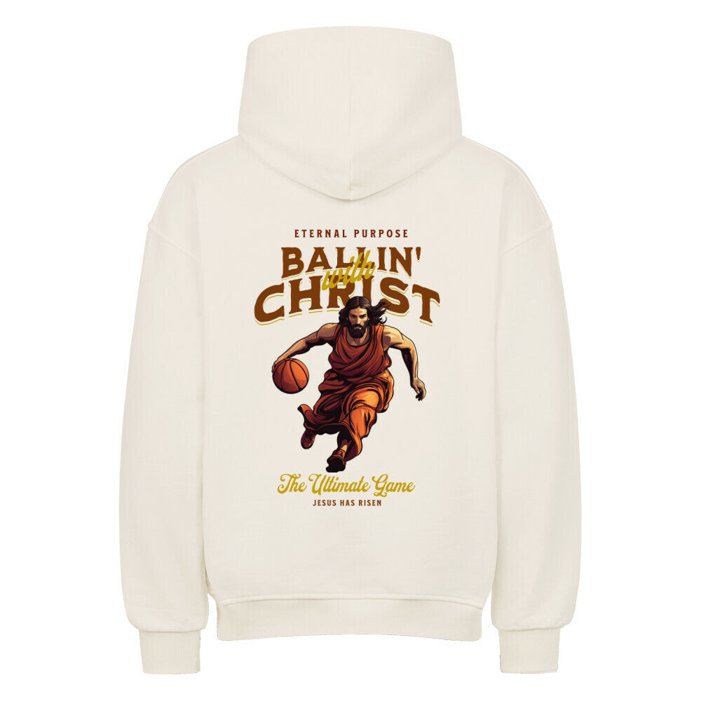 Rückansicht eines natural raw Oversized-Hoodies mit 'Ballin' with Christ' Print, der Jesus beim Basketball-Dribbling zeigt, und dem Text 'Eternal Purpose'. 80% Baumwolle 20% Polyester.