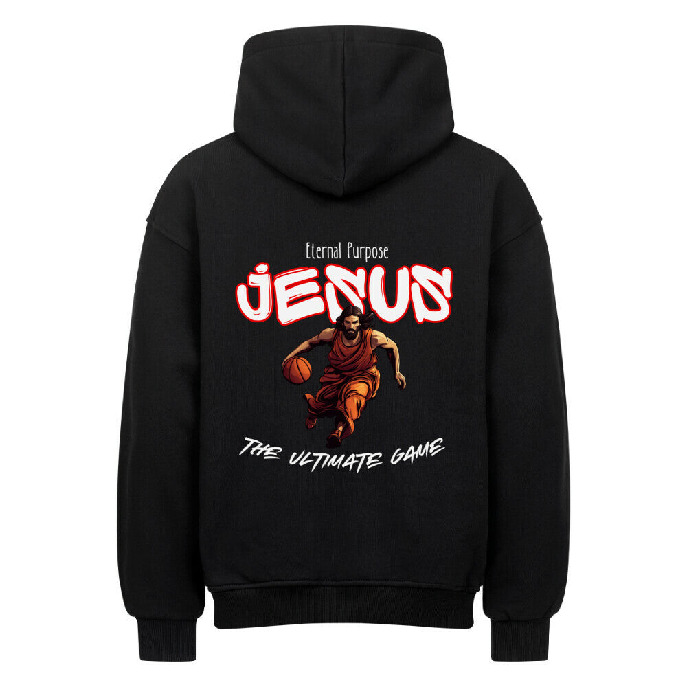 Rückansicht eines Schwarzen Oversized-Hoodie mit 'Jesus' Print, der Jesus beim Basketball-Dribbling zeigt, umgeben von Text 'Eternal Purpose' und 'The Ultimate Game'. 100% Baumwolle.